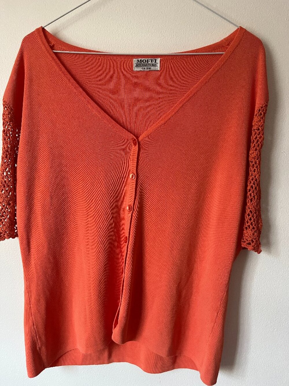 Beautiful cardigan trendy orange colour, size small n sknitting silky finish wit